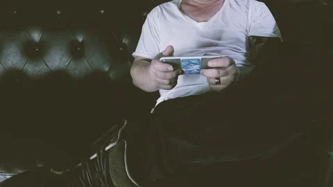 Gamer Playing mobile app multiplayer 4k  Stock Footage 91840191