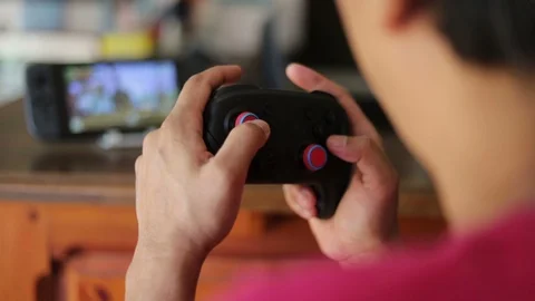 Gamer playing  on Nintendo Switch. Stock-Footage 109324515