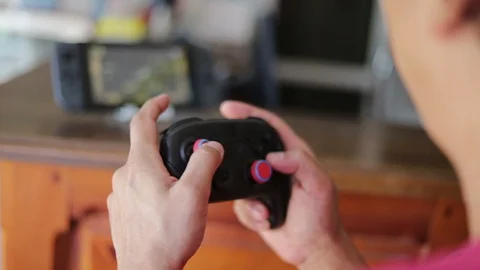 Gamer playing  on Nintendo Switch. Video stock 109324523