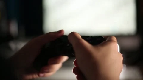 Gamer Playing Video Games with Controller Stock Footage 65004183