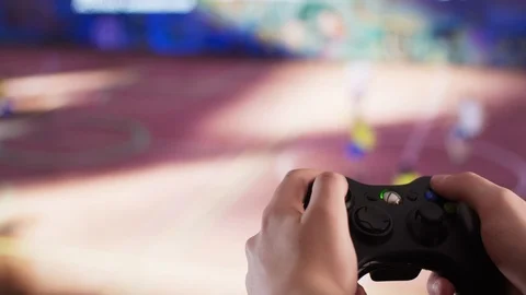 Gamer Playing Video Games With Controller Video stock 106379256