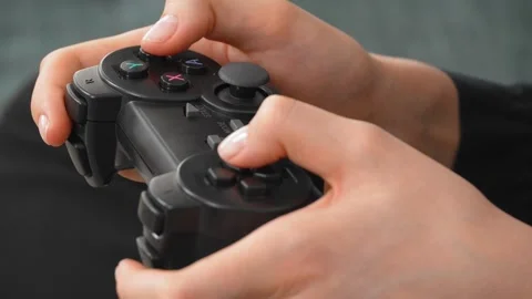 Gamer playing with wireless controller Video stock 308230919