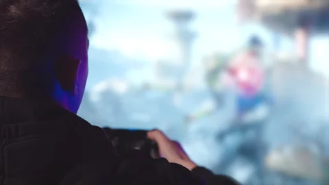 The gamer plays a computer game with a joystick Stock-Footage 149300666