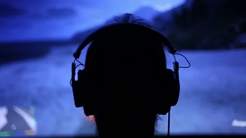 Gamer Plays Video Games Isolated in a Dark Room Stock Footage