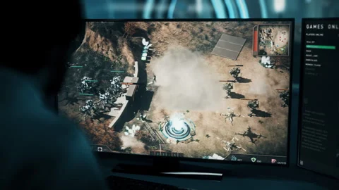 Gamer takes part in the multiplayer internet match of a strategy simulator Stock Footage 257939010