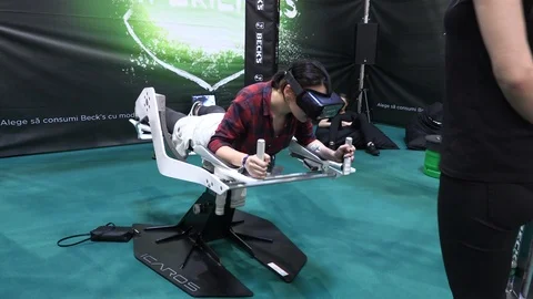Gamer testing VR machine at video game showroom Stock Footage 91869157