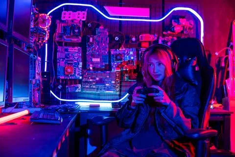 Gamer using joystick controller for virtual tournament plays online video game 스톡 사진