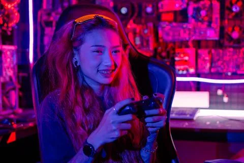 Gamer using joystick controller for virtual tournament plays online video g.. Stock Photos