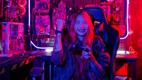 Gamer using joystick controller for virtual tournament plays online video g.. Stock Photos