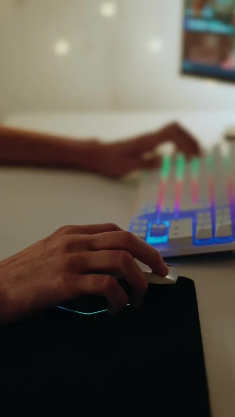 Gamer's Hands on a Computer Mouse and Keyboard While Playing a Video Game Stock Footage 336316893