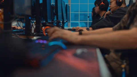 Gamers Playing In Internet Cafe Racking Focus 스톡 동영상 112055649