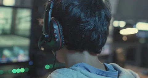 Gamers playing multiplayer video games online Stock Footage 168248752