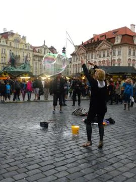 Games in the square (soap bubble) Stock Photos