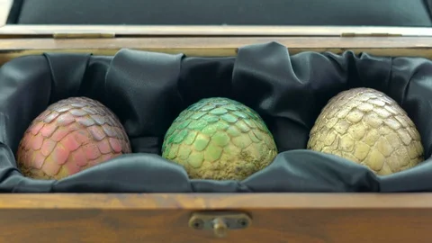 Games of Thrones HBO authorized replica of Dragon's Eggs in wooden case. Stock Footage 93879474