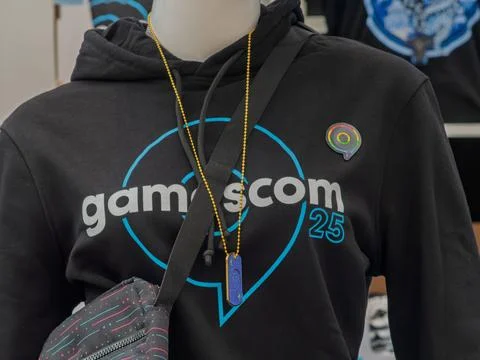 Gamescom 2025 Merchandise Display Featuring Hoodie and Accessories Stock Photos
