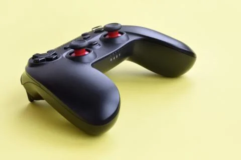 Gamesir g3s video game controller on yellow background Stock Photos