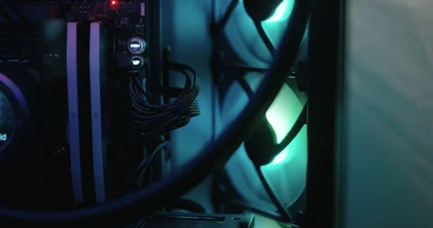 Gaming computer being powered on and fans spinning Stock Footage 306199730