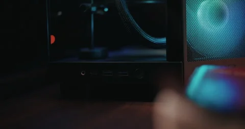 Gaming computer being powered on and fans spinning Stock Footage 306199738