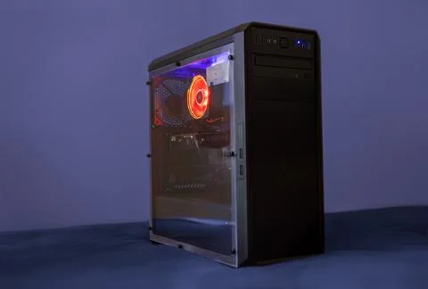 Gaming computer with LEDs on a desk 스톡 사진