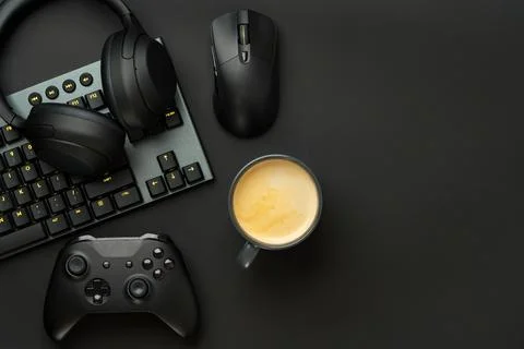 Gaming concept on black background with computer keyboard and joystick 스톡 사진