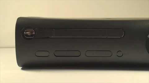 Gaming Console Hand Detail Pushing The Eject Button Putting Disk In Tray, Gaming Stock Footage 39351229