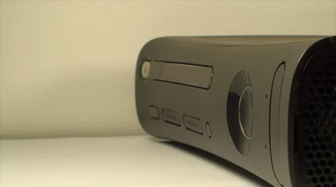 Gaming Console Hand Detail Pushing The Eject Button Putting Disk In Tray, Pan Stock Footage 39351318