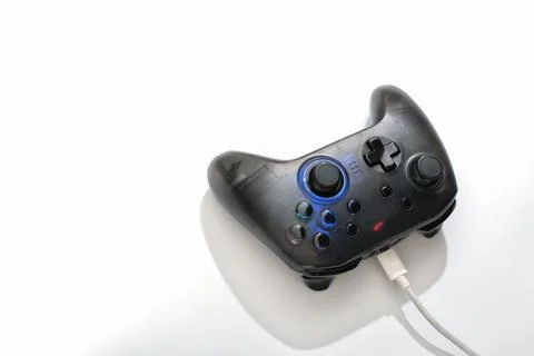 Gaming controller on white background, gaming and esports challenge, stream.. Stock Photos