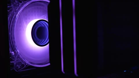 Gaming desktop computer with purple backlight close-up Stock Footage 283449671