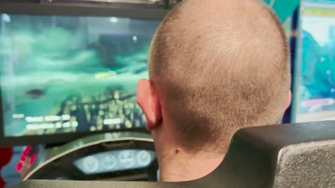 Gaming in a flight simulator, intense virtual flying, person engaged in Stock Footage 306165195