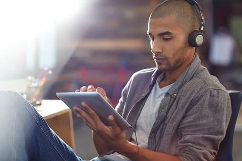 Gaming, headphones and tablet with developer man in office for software upd.. 스톡 사진