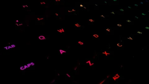 Gaming keyboard RGB hacker with colourful led motion gradient in 4K Stock Footage