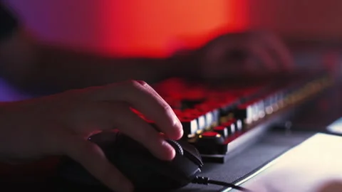Gaming night competition fun hands typing keyboard Stock Footage 239930024
