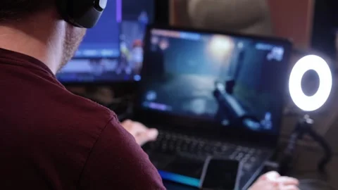 Gaming over shoulder Stock Footage 326265524