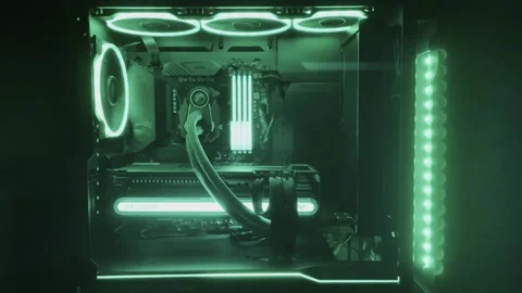 Gaming Pc Glowing Green In The Dark - The System Unit Of A Modern Computer Stock Footage 242395038