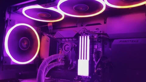 Gaming Pc Glowing Pink In The Dark - The System Unit Of A Modern Computer Stock Footage 242395859