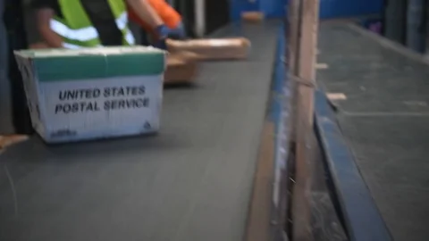 GAMT processes all mail arriving by plane from CONUS and OCONUS locations - 2018 Stock Footage 99640607
