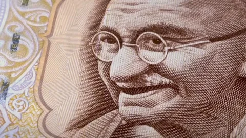 Gandhi’s Face on Indian Currency Note (Close-up) Stock Footage 318200061