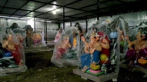 Ganesh idols covered in plastic ready for Ganpati Chaturthi festival India Video stock 315549473