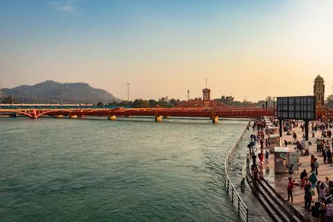Ganges river bank with devotee crowed at evening from flat angle 스톡 사진