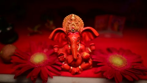Ganpati bappa lighting effect video , god ganesha with flower decoretion Stock Footage 162623715