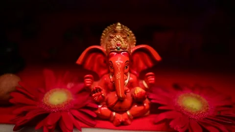 Ganpati bappa lighting effect video , god ganesha with flower decoretion Stock Footage 162623879