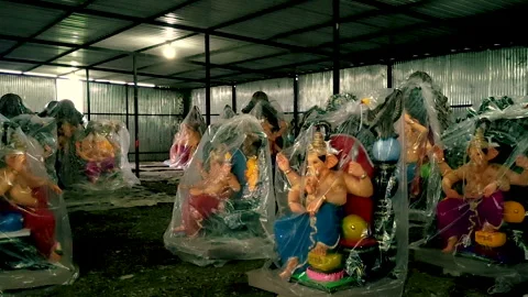 Ganpati idols covered in plastic ready for Ganesh Chaturthi festival India Video stock 315549466