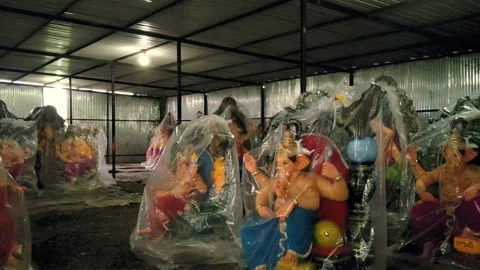 Ganpati idols wrapped in plastic ready for Ganesh Chaturthi festival India Video stock 315549454
