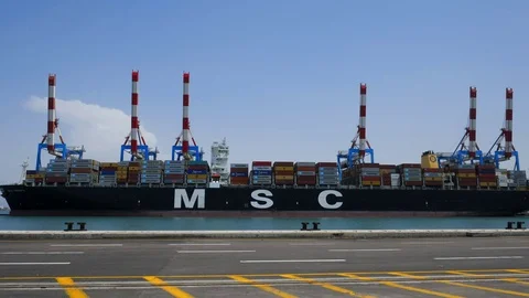 Gantry crane boom down over container ship 4k intro outro for business  Stock Footage 89609402