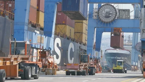 Gantry crane lifting container and from ship with cargo 4k for shipping business Stock Footage 115934762
