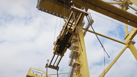 Gantry Crane Lifting Container Spreader at Shipping Dock. Stock Footage 334250638