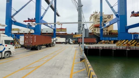 Gantry Crane Swings Container Over Ship Bow at Port of Guayaquil Quay Video stock 343811457