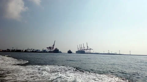 Gantry cranes and ship docks at Yokohama Port Stock Footage 137587043