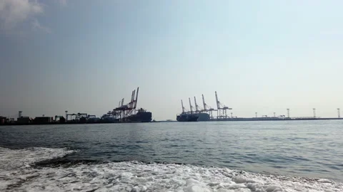 Gantry cranes and ship docks at Yokohama Port Stock Footage 137588052