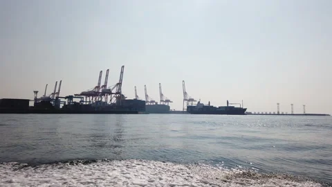 Gantry cranes and ship docks at Yokohama Port Stock Footage 137639839